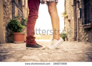 stock-photo-couple-kissing-outdoors-lovers-on-a-romantic-date-at-sunset-girls-stands-on-tiptoe-to-kiss-her-280073906